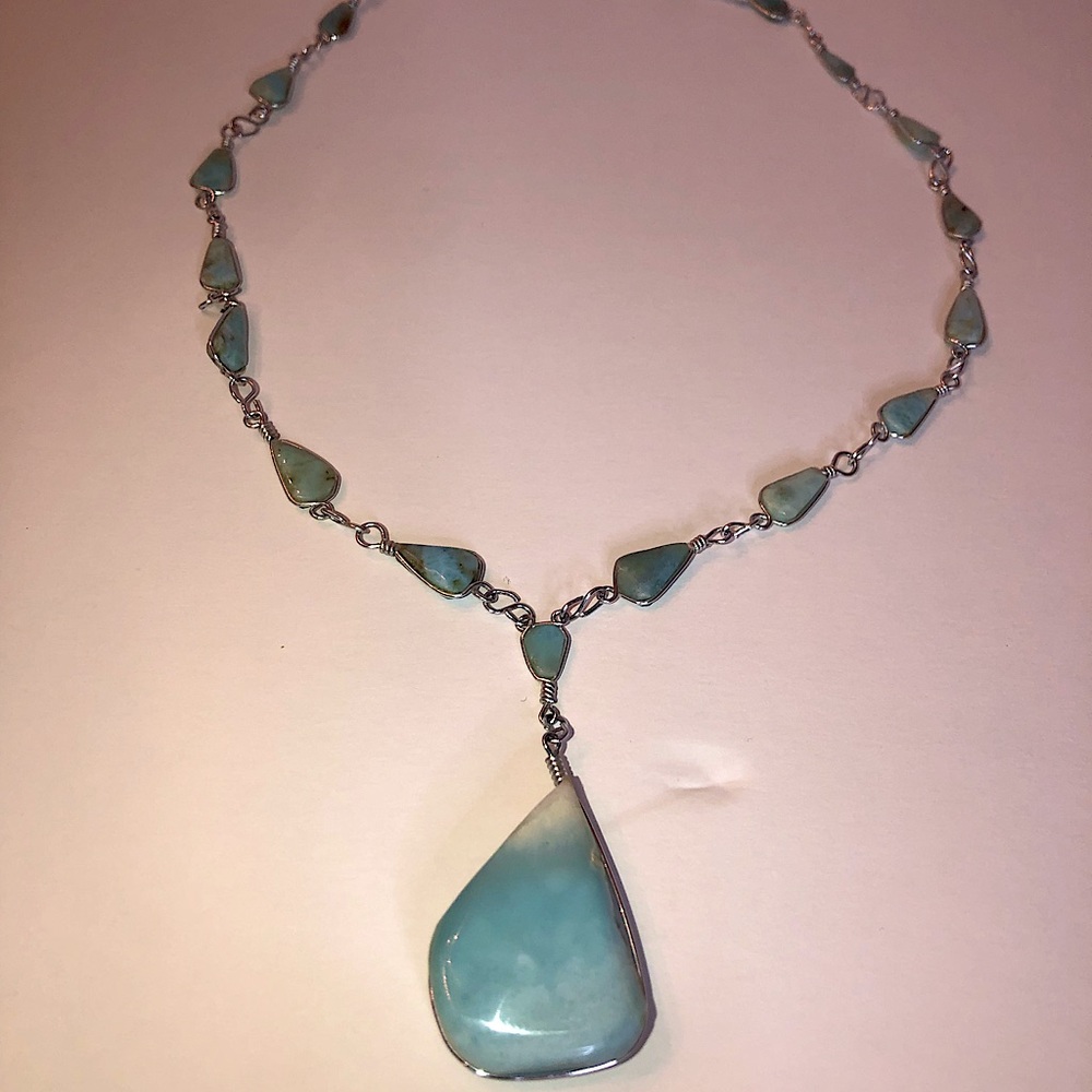 Natural blue stone  in a silver link necklace